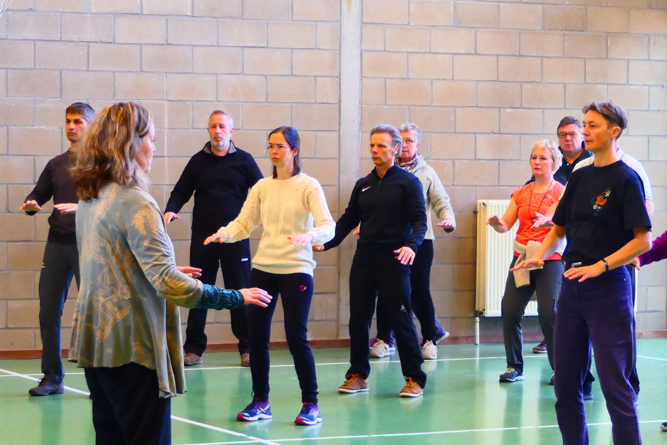 Master Annukka leading a qigong workshop in England.
